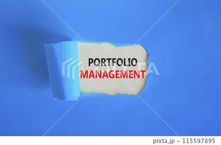 Portfolio management symbol. Concept words Portfolio management on beautiful white paper. Beautiful blue paper background. Business Portfolio management concept. Copy space. 115597895