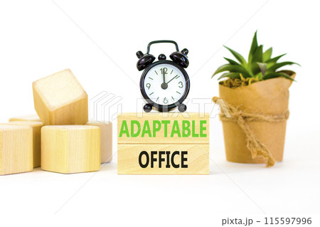 Adaptable office symbol. Concept words Adaptable office on beautiful wooden block. Beautiful white paper background. Black alarm clock. Business Adaptable office concept. Copy space. Adaptable office symbol. Concept words Adaptable office on beautiful wooden block. Beautiful white paper background. Black alarm clock. Business Adaptable office concept. Copy space. 115597996