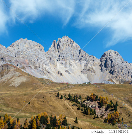 Autumn alpine mountain lake near San Pellegrino Pass, Trentino, Dolomites Alps, Italy. 115598101