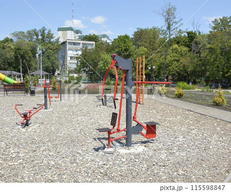 street exercise equipment at the school stadium. outdoor sports 115598847