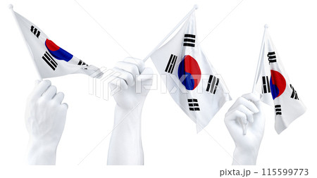 Hands waving South Korea flags isolated on white 115599773