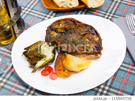 Baked head of lamb 115603756