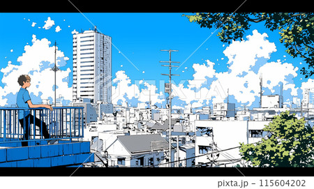 都市の町並みと夏の青空