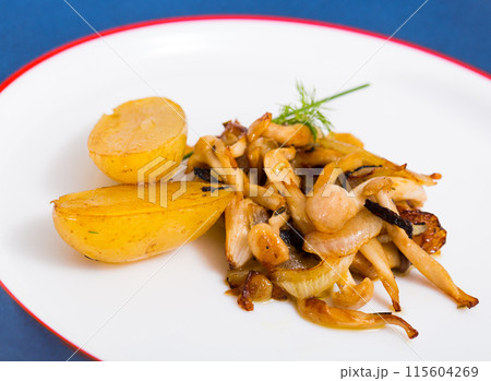 Tasty cooked fried baby potatoes with fried shitake mushrooms Tasty cooked fried baby potatoes with fried shitake mushrooms 115604269