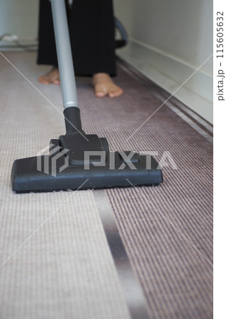 Regular carpet cleaning is essential for cleanliness at home, so frequent vacuuming is necessary Regular carpet cleaning is essential for cleanliness at home, so frequent vacuuming is necessary 115605632