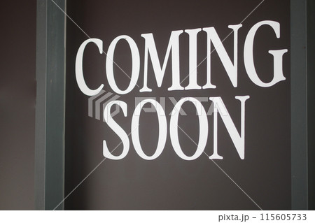 Highquality Coming Soon Sign Announcement on Dark Background for an Upcoming Event 115605733