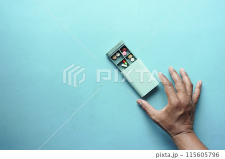 top view of medical pills in a pill box on table  115605796