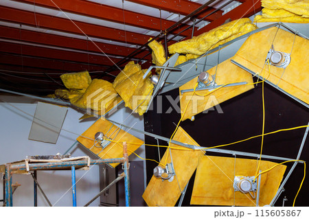 During renovation construction of commercial premises building, damaged ceiling is demolition 115605867