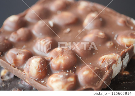 dark chocolate mixed with hazelnuts dark chocolate mixed with hazelnuts 115605914