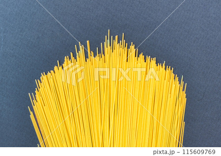 Spaghetti pasta on light blue background 115609769