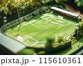 ミニチュアサッカー場模型：芝のフィールドとスタジアム 115610361