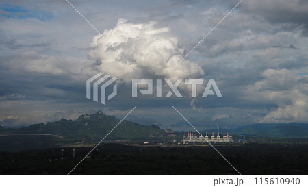The pipe cooling tower emits an industrial white steam, creating a conceptual environment The pipe cooling tower emits an industrial white steam, creating a conceptual environment 115610940