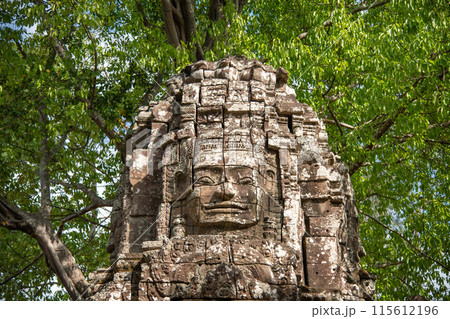 Stone faces of Bayon temple, Angkor Thom, Siem Reap, Cambodia Stone faces of Bayon temple, Angkor Thom, Siem Reap, Cambodia 115612196