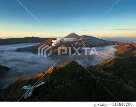 Aerial drone view of Bromo active volcano with Kingkong hill viewpoint, Tengger Semeru national park, East Java, Indonesia Aerial drone view of Bromo active volcano with Kingkong hill viewpoint, Tengger Semeru national park, East Java, Indonesia 115612200