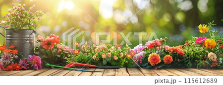 Wooden table covered in various colorful flowers and garden tools, set against a blurred natural background. Generative AI 115612689
