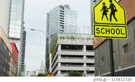 School zone yellow road sign, pedestrian crossing. Children safety on street, Queens, New York City. 115612720