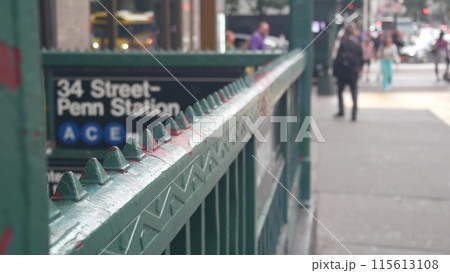New York subway sign, underground metro station. Metropolitan entrance fence, 34 street Penn Station 115613108