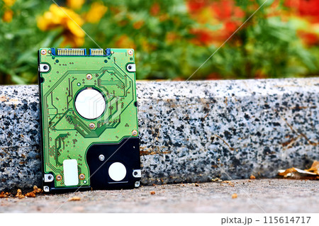 Green Internal hard drive for storing information on sidewalk 115614717
