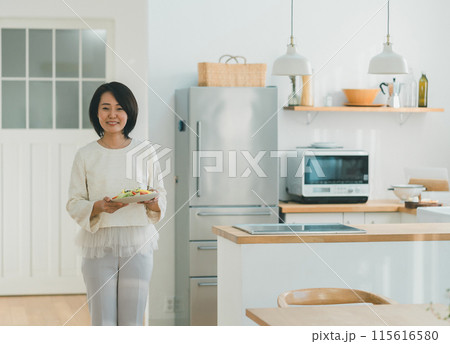 a forty-something woman a forty-something woman 115616580