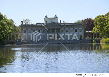 Beauty palace on isle at lake in baths park in Warsaw city in Poland Beauty palace on isle at lake in baths park in Warsaw city in Poland 115617989
