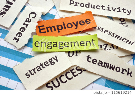 Pieces of paper with words employee engagement. Pieces of paper with words employee engagement. 115619214