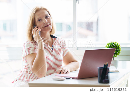 Woman with computer. Working female at laptop Woman with computer. Working female at laptop 115619281