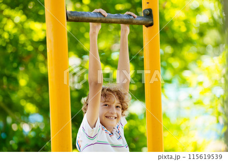 Child on playground. Active kid in school yard. 115619539