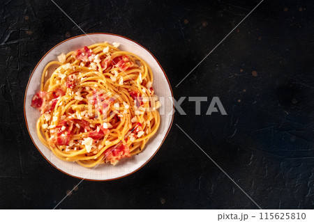 Carbonara pasta dish, traditional spaghetti with pancetta and cheese Carbonara pasta dish, traditional spaghetti with pancetta and cheese 115625810