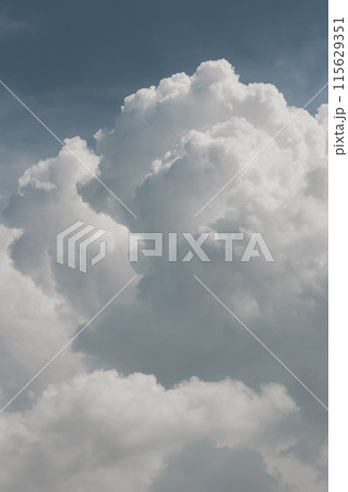 white thunderclouds in blue sky. summer cumulus clouds before rain. Beautiful view of nature white thunderclouds in blue sky. summer cumulus clouds before rain. Beautiful view of nature 115629351