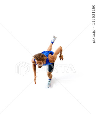 Spirit of competitive run. Top view of muscular sportive man, runner in motion, running isolated on white studio background Spirit of competitive run. Top view of muscular sportive man, runner in motion, running isolated on white studio background 115631160