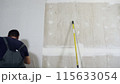 Time lapse of wallpapering in the room. 115633054