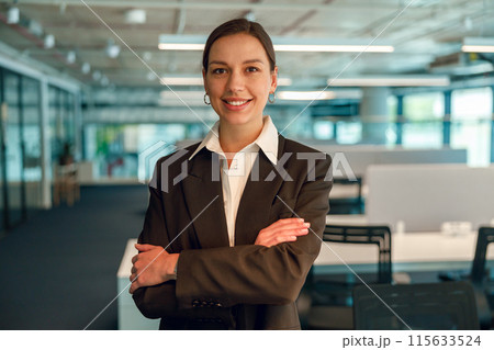 Confident businesswoman showing professionalism and successful leadership in corporate environment Confident businesswoman showing professionalism and successful leadership in corporate environment 115633524