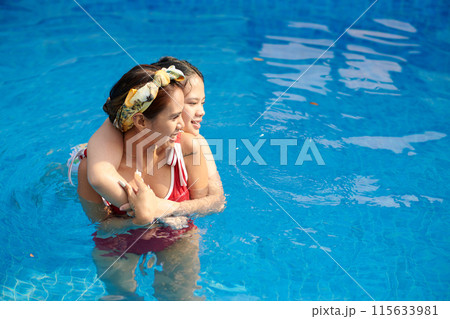 Daughter and Mother Swimming in Deep Pool Daughter and Mother Swimming in Deep Pool 115633981