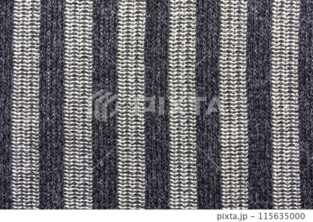 Background, texture, wool fabric with vertical stripes of black and bright colors Background, texture, wool fabric with vertical stripes of black and bright colors 115635000