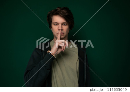 Man Making a Hush Gesture 115635049