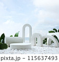 Geometric concrete podium on tropical beach with flowers. Empty showcase for packaging product  115637493