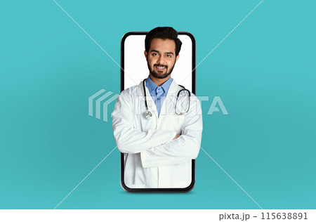 A young Indian guy medical professional is shown on a telemedicine app within a smartphone, positioned in a professional yet approachable setting 115638891