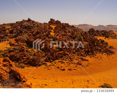 spot in Tenerife with many red rocks and beautiful mountain landscape background spot in Tenerife with many red rocks and beautiful mountain landscape background 115638994