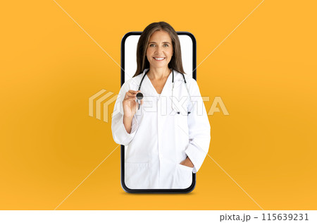 A smiling lady doctor in a white lab coat holds a stethoscope, appearing to step out from a smartphone screen against a bright yellow background. 115639231