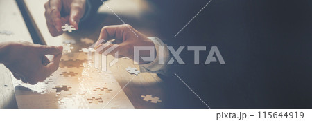 Banner Implement puzzle improve hand holding together solve synergy organize team connection plan trust strategy. Stakeholder business trust teams hands holding jigsaw puzzle synergy with copy space Banner Implement puzzle improve hand holding together solve synergy organize team connection plan trust strategy. Stakeholder business trust teams hands holding jigsaw puzzle synergy with copy space 115644919