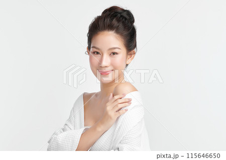 Beautiful young asian woman with clean fresh skin on white background, Face care, Facial treatment, Cosmetology, beauty and spa, Asian women portrait. Beautiful young asian woman with clean fresh skin on white background, Face care, Facial treatment, Cosmetology, beauty and spa, Asian women portrait. 115646650