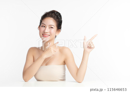 Beautiful young asian woman with clean fresh skin on white background, Face care, Facial treatment, Cosmetology, beauty and spa, Asian women portrait. Beautiful young asian woman with clean fresh skin on white background, Face care, Facial treatment, Cosmetology, beauty and spa, Asian women portrait. 115646653