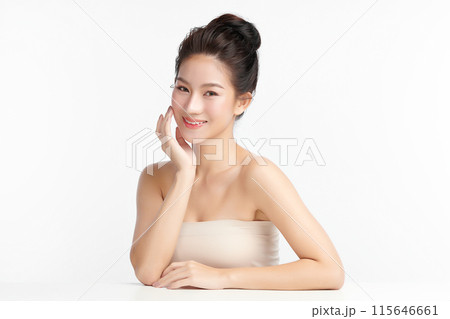 Beautiful young asian woman with clean fresh skin on white background, Face care, Facial treatment, Cosmetology, beauty and spa, Asian women portrait. Beautiful young asian woman with clean fresh skin on white background, Face care, Facial treatment, Cosmetology, beauty and spa, Asian women portrait. 115646661