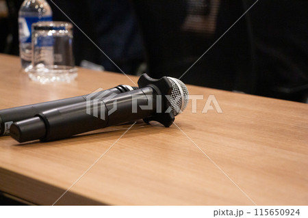 Bangkok,Thailand-November 12,2022 -  Microphone or mike is a device that receives sound and converts it into electrical signals. Commonly used in various tasks such as public speaking,sing,voice 115650924