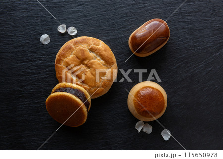 Japanese sweets on black stone Japanese sweets on black stone 115650978