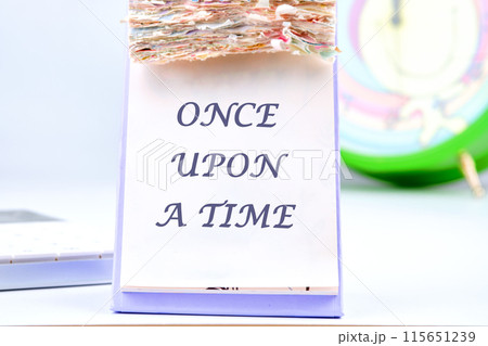 Once upon a time words the inscription on the calendar with tear-off leaves 115651239