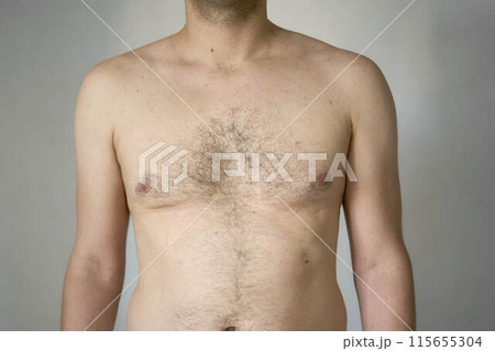 chest and stomach of a thirty-year-old with average build 115655304