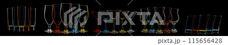 Silhouette of multicolor neon different glasses on black background 115656428
