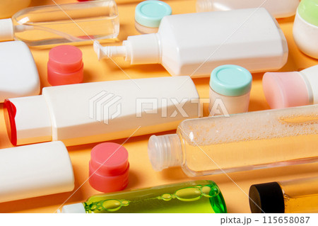 Group of plastic bodycare bottle Flat lay composition with cosmetic products on colored background empty space for you design. Set of White Cosmetic containers, top view with copy space 115658087
