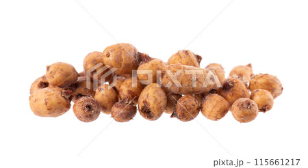 Tiger nuts isolated on white background. Pile of chufa nuts, earth almond or chufa sedge. Cyperus esculentus. 115661217